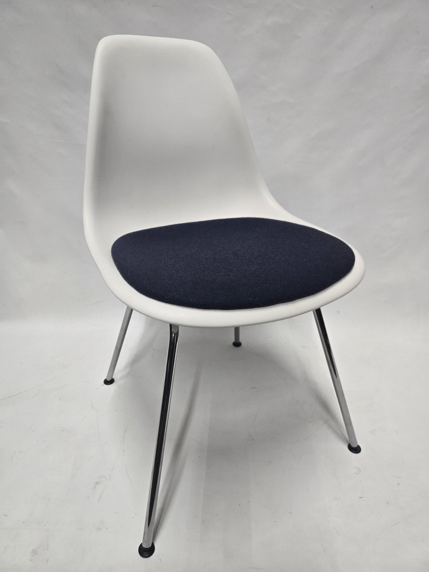 Herman Miller Eames Plastic Molded Chair in White with Blue Cushion