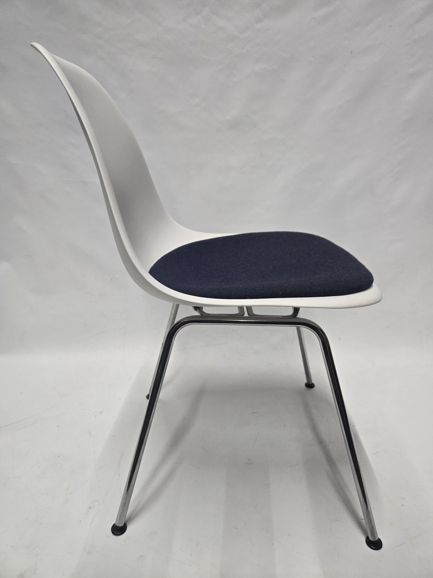 Herman Miller Eames Plastic Molded Chair in White with Blue Cushion