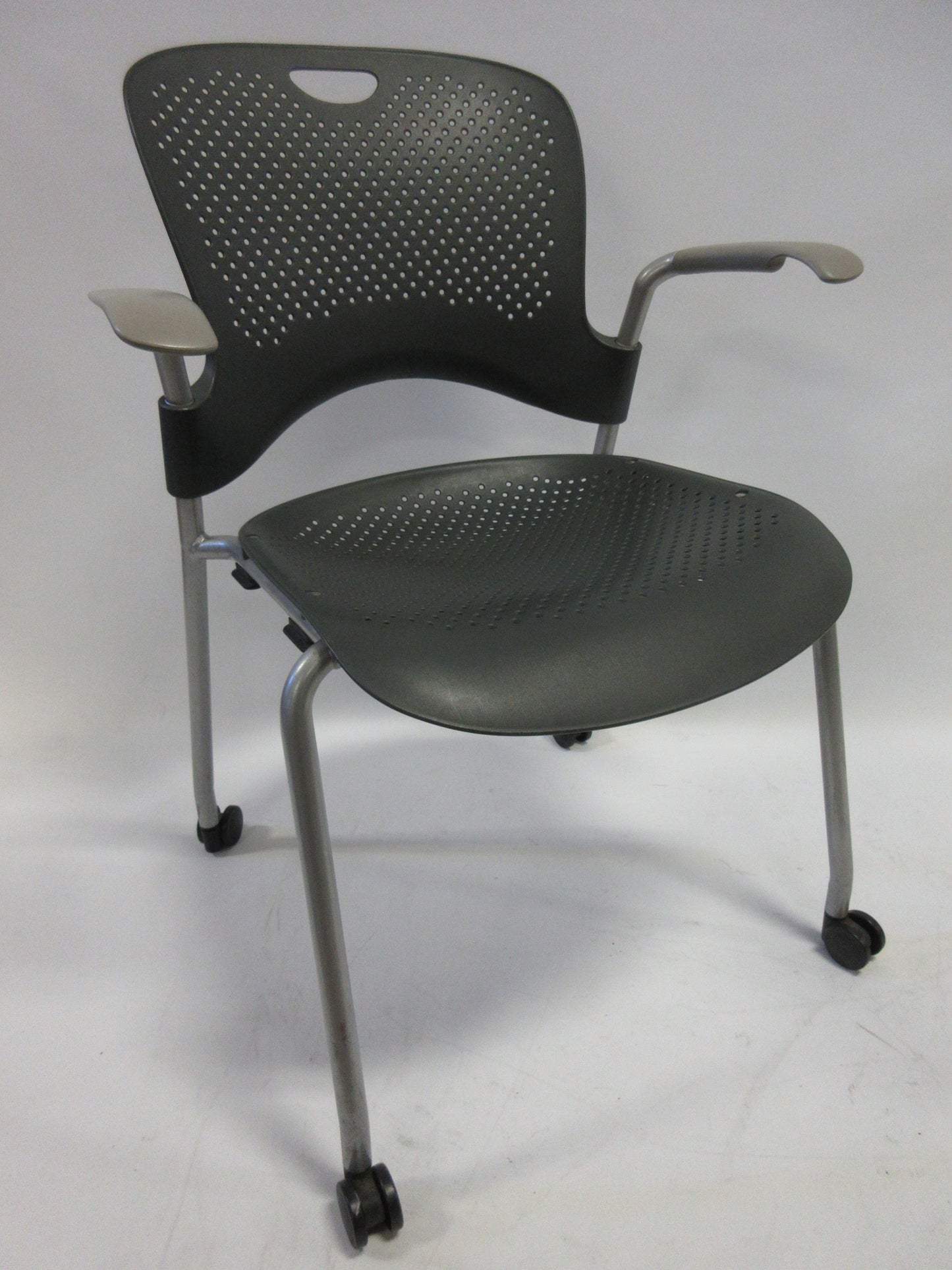 Herman Miller Caper Armchair in Black with Plastic Seat, Grey Legs and Wheels