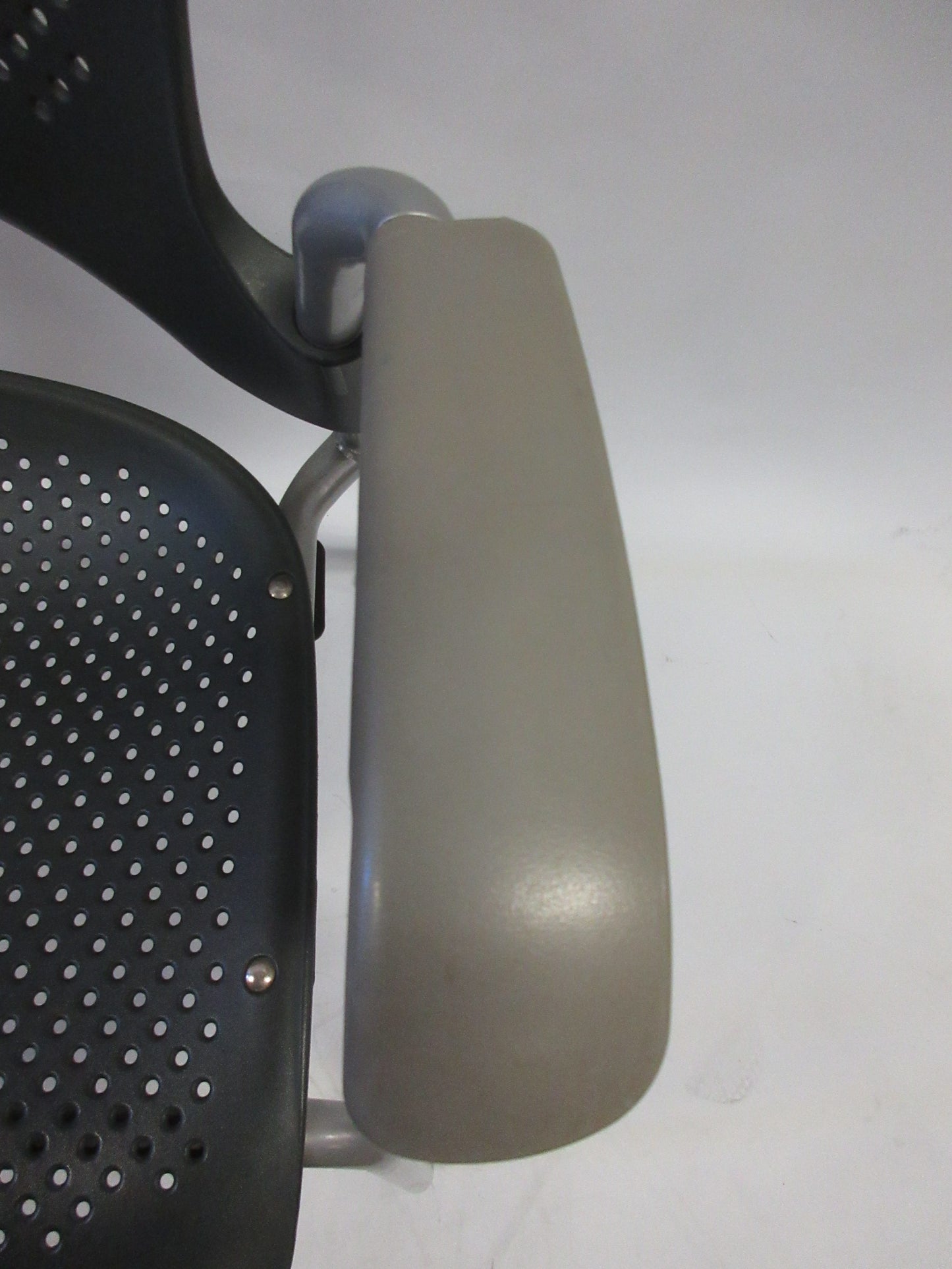 Herman Miller Caper Armchair in Black with Plastic Seat, Grey Legs and Wheels