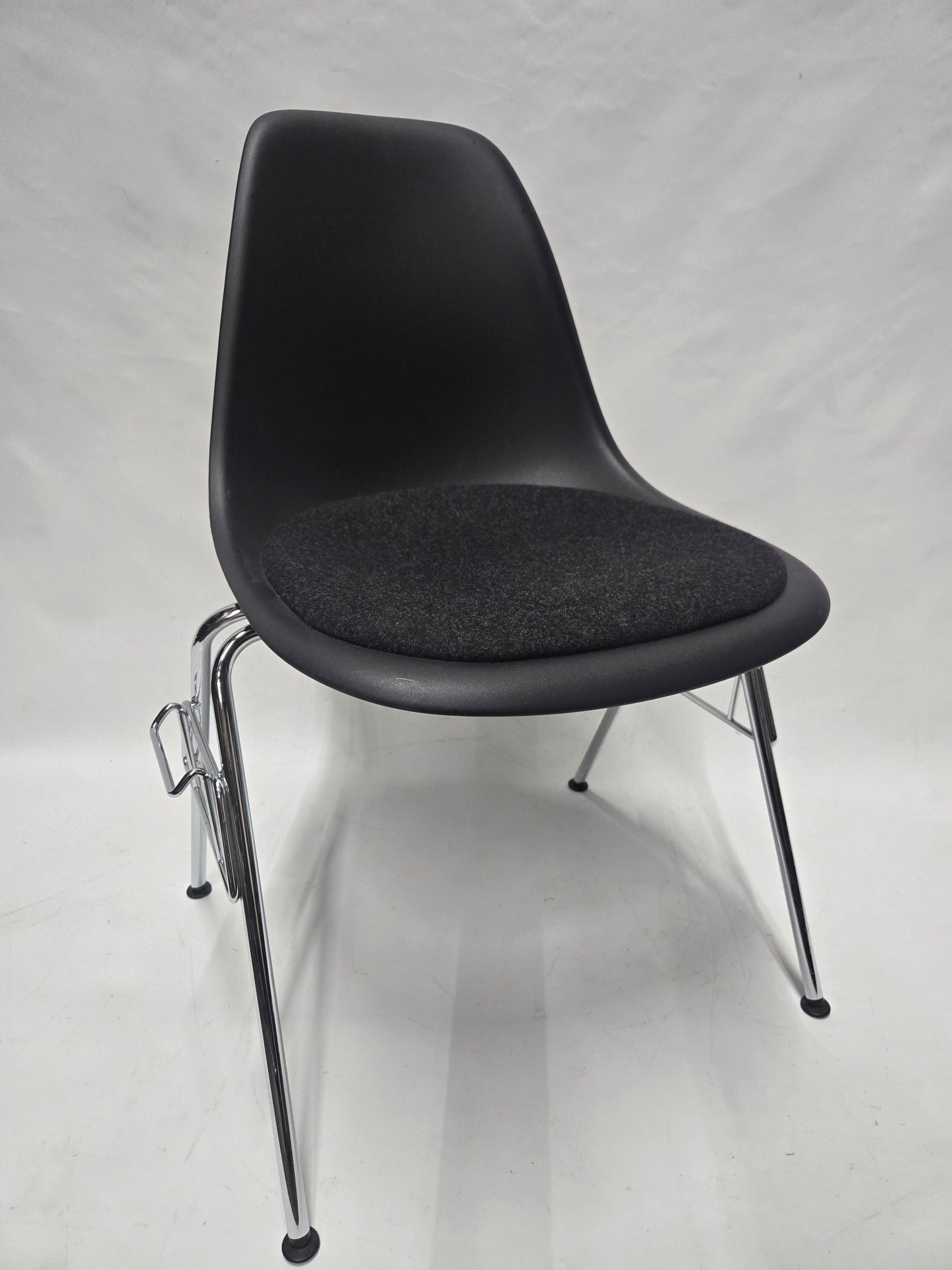 Vitra Eames Plastic Molded Chair in Black with Grey Cushion