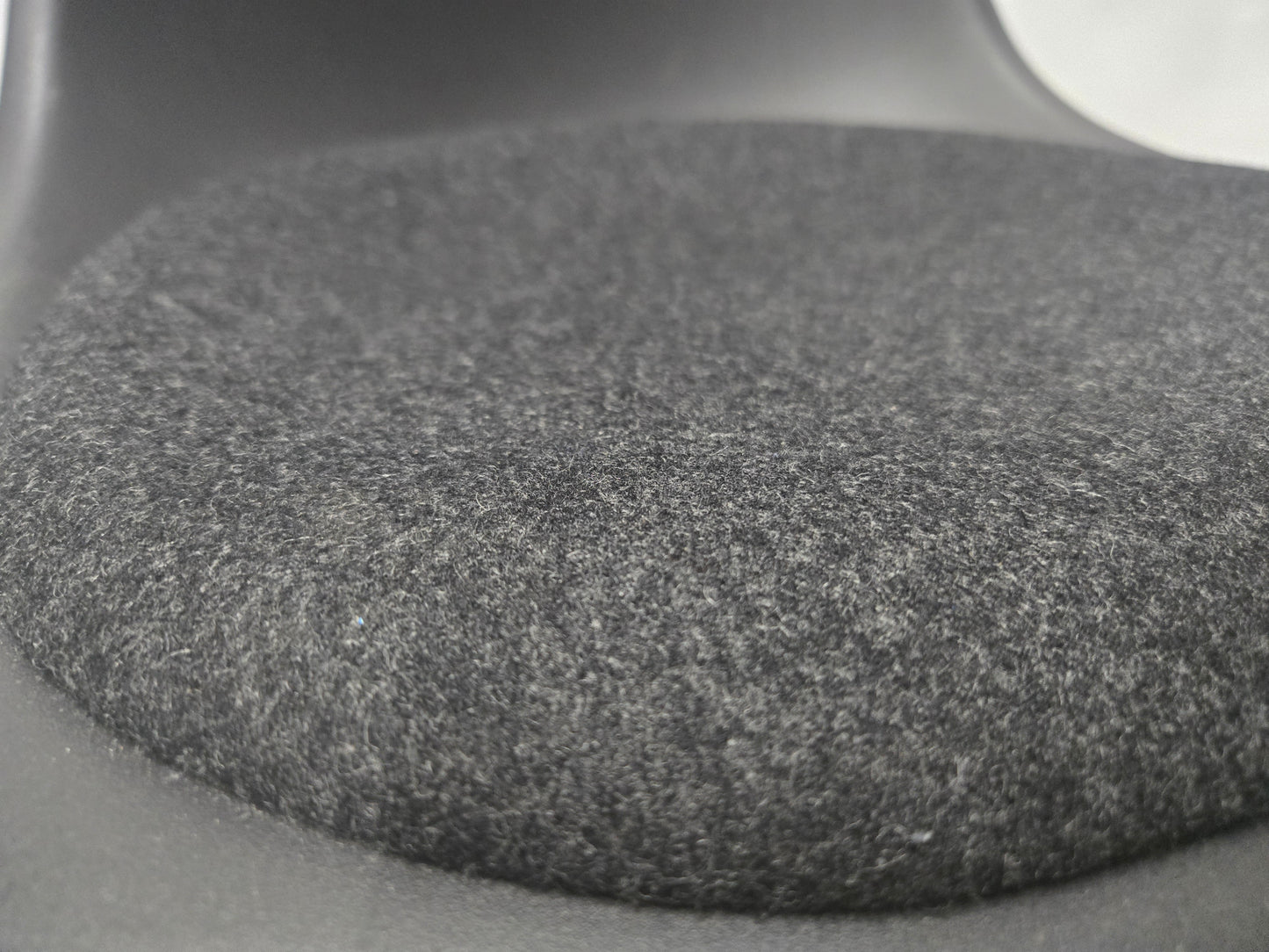 Vitra Eames Plastic Molded Chair in Black with Grey Cushion