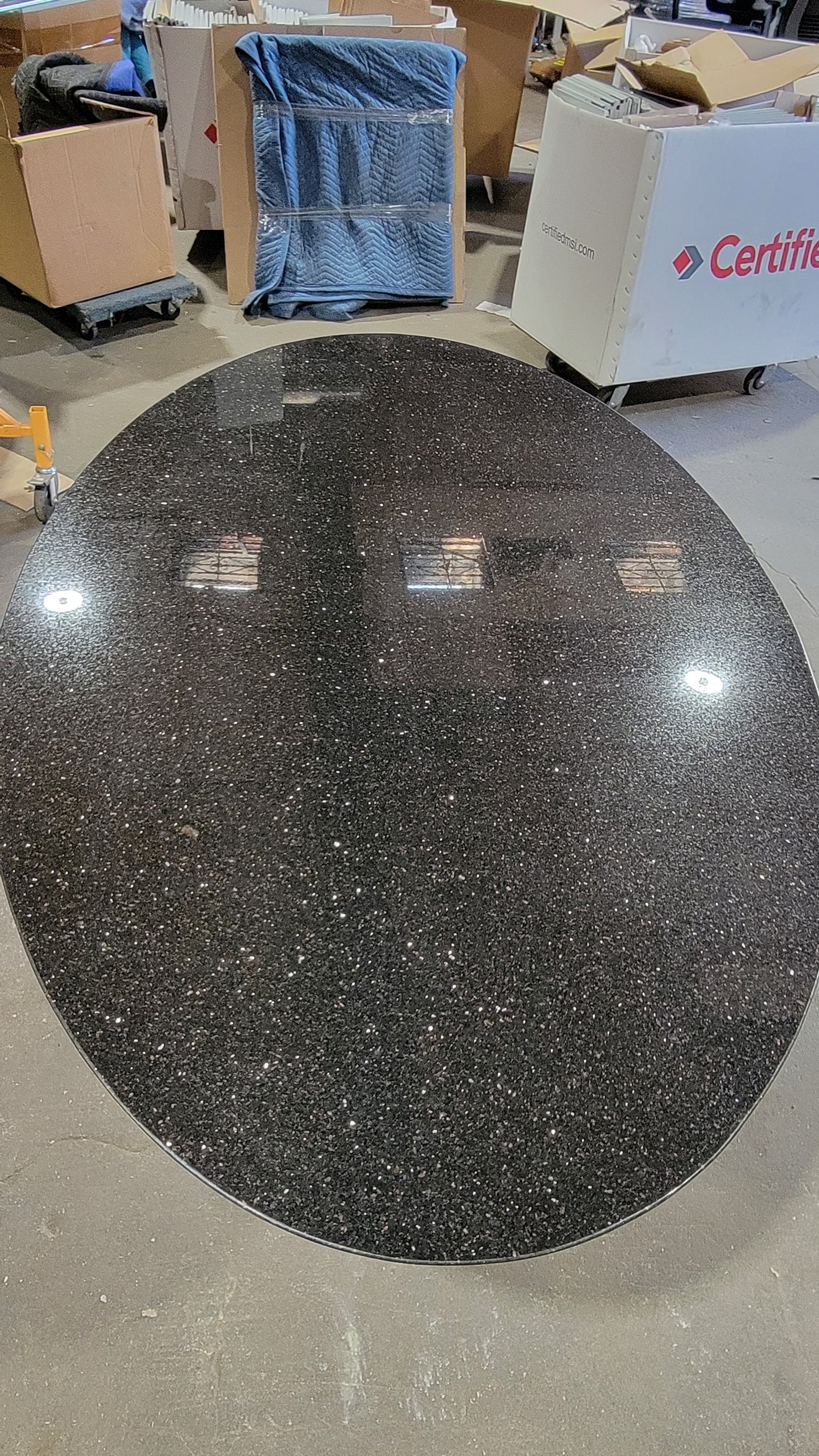 West Elm 6-ft Oval Tulip Dining Table with Black Stone Top