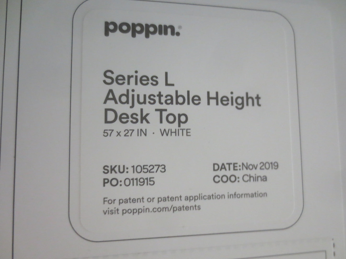 Poppin Series L 57x27-in Sit-Stand Desk in White