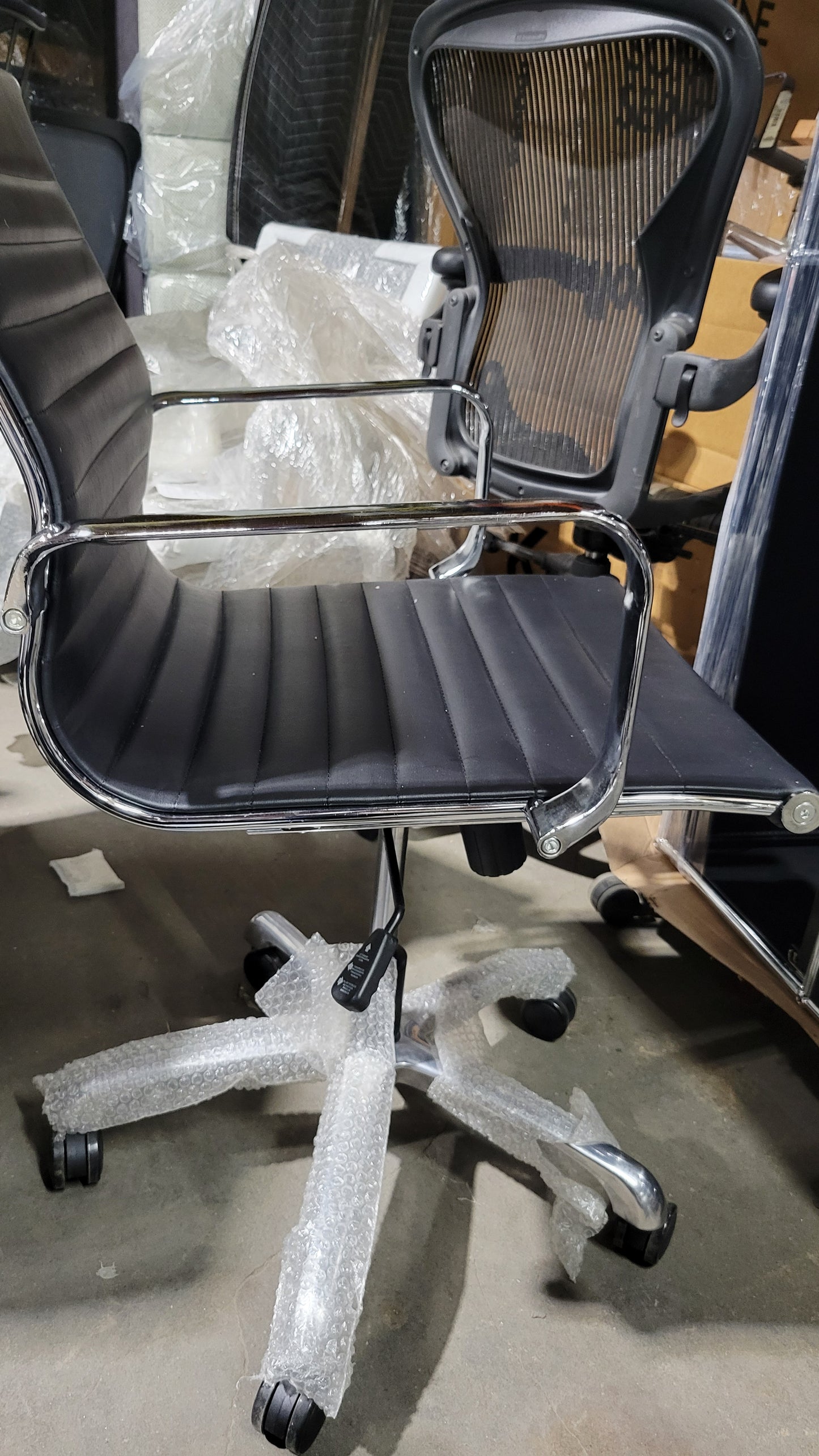 Woodstock Janis Low Back Conference Chair in Black Eco-Leather