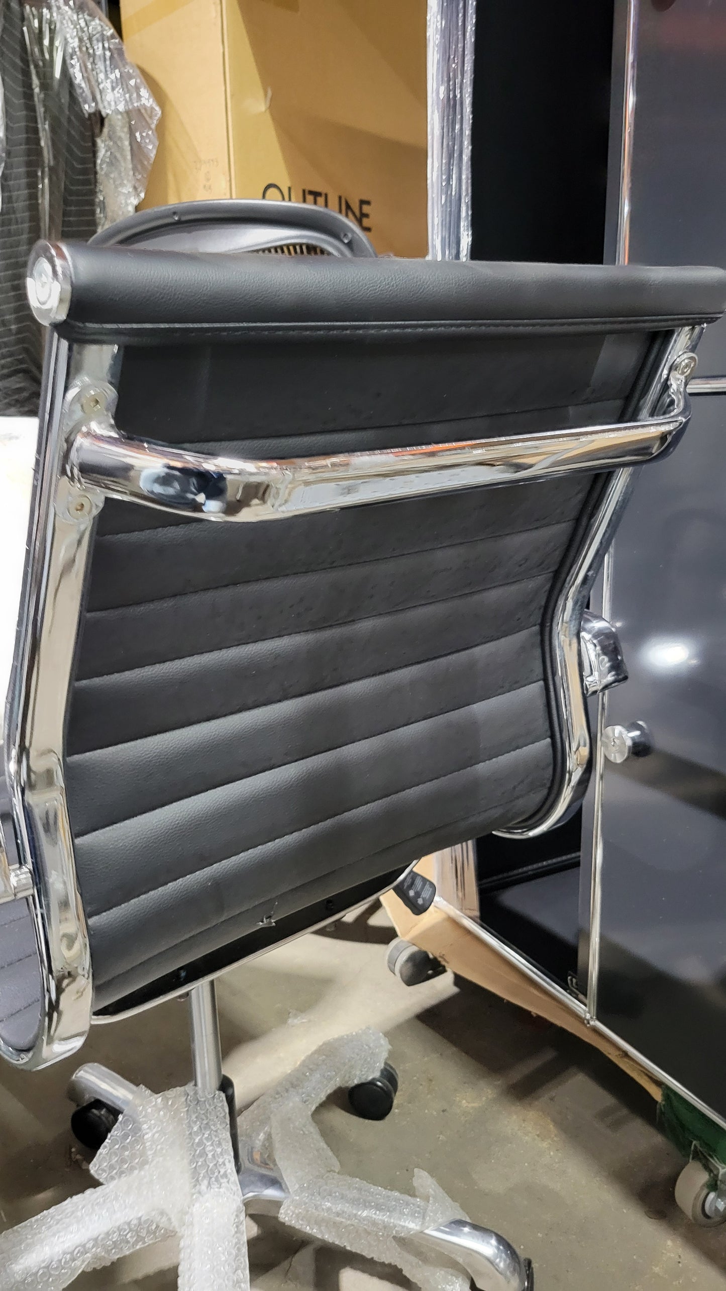Woodstock Janis Low Back Conference Chair in Black Eco-Leather