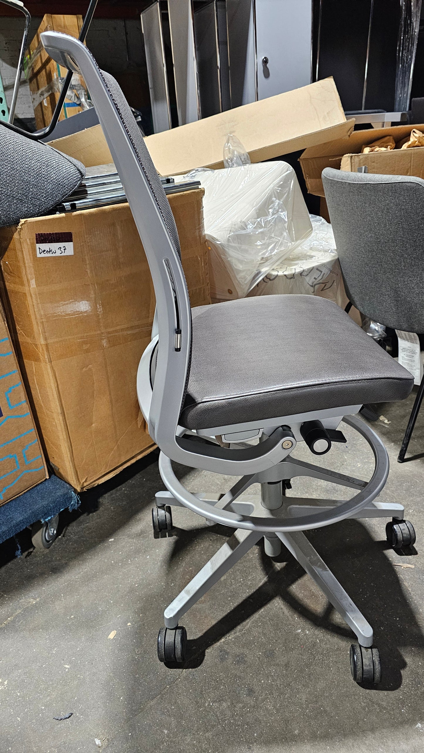 Steelcase Think V2 Armless Drafting Stool in Black Back and Brown Eco-Leather Seat