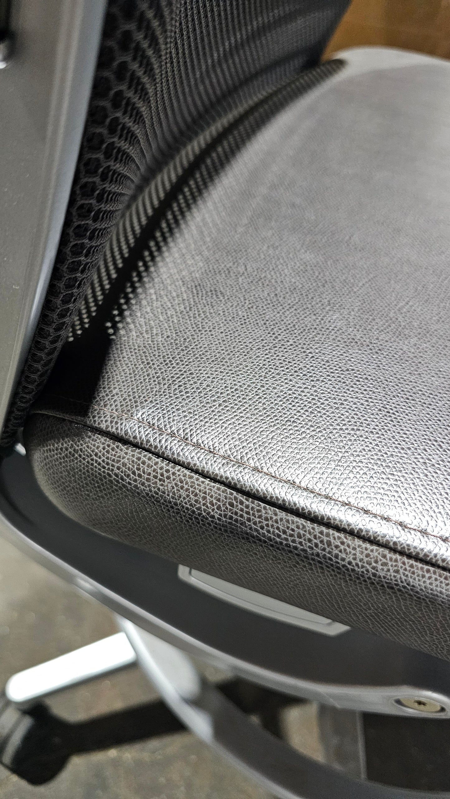 Steelcase Think V2 Armless Drafting Stool in Black Back and Brown Eco-Leather Seat