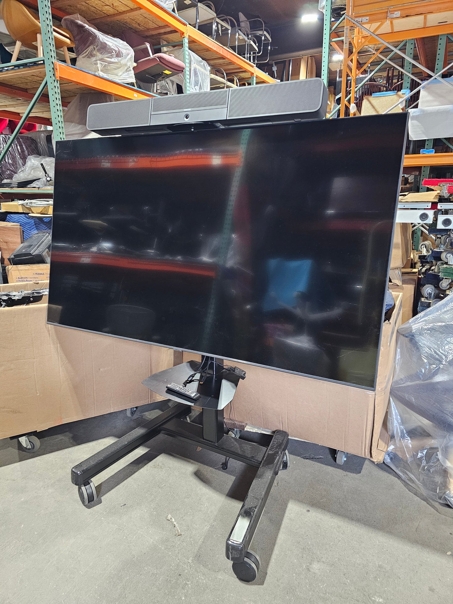 Samsung BE75T-H 75" Commercial LED TV with Chief Mobile Stand + Crestron UC-SB1-CAM Video Conference Smart Soundbar & Camera