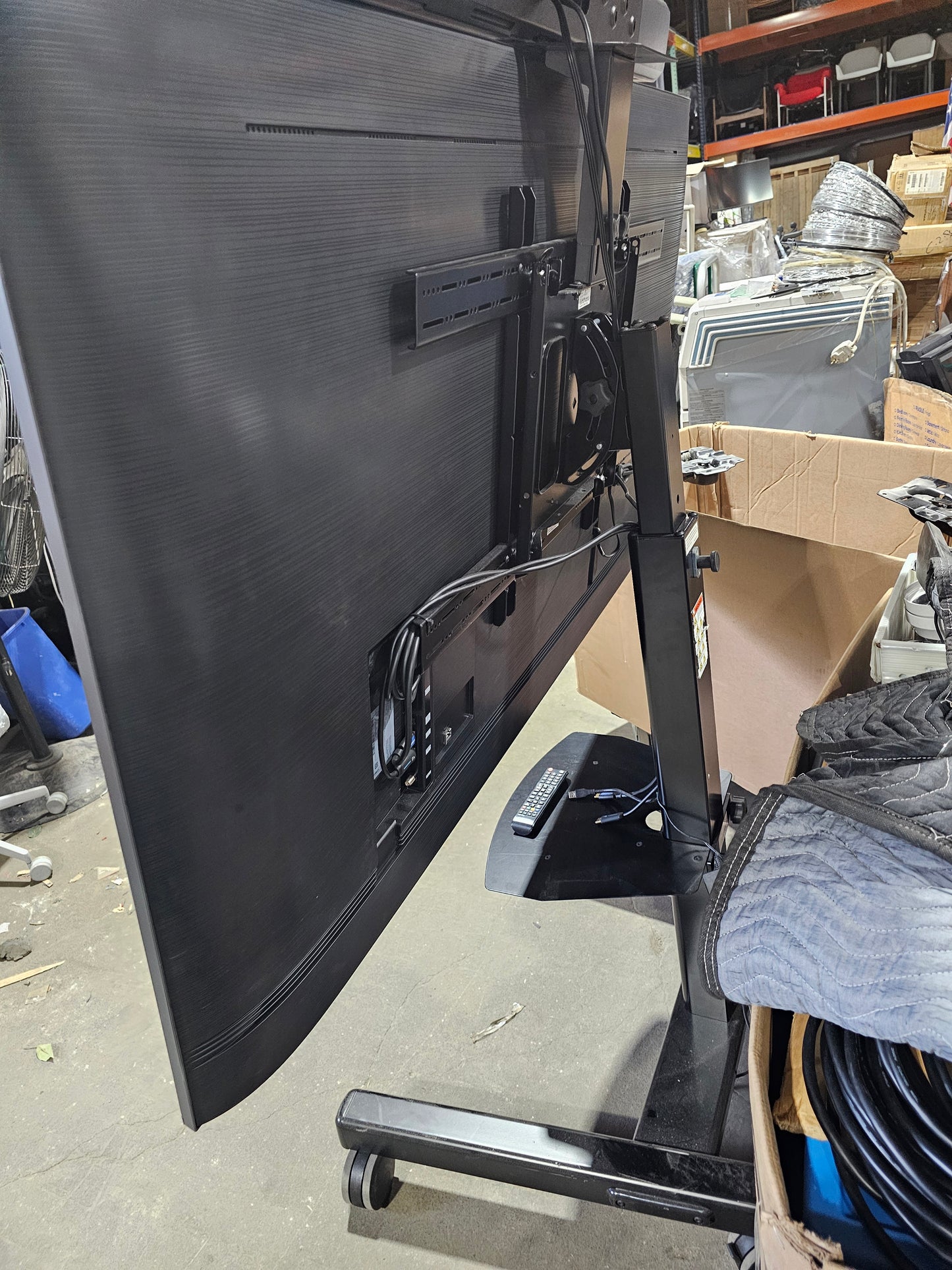 Samsung BE75T-H 75" Commercial LED TV with Chief Mobile Stand + Crestron UC-SB1-CAM Video Conference Smart Soundbar & Camera