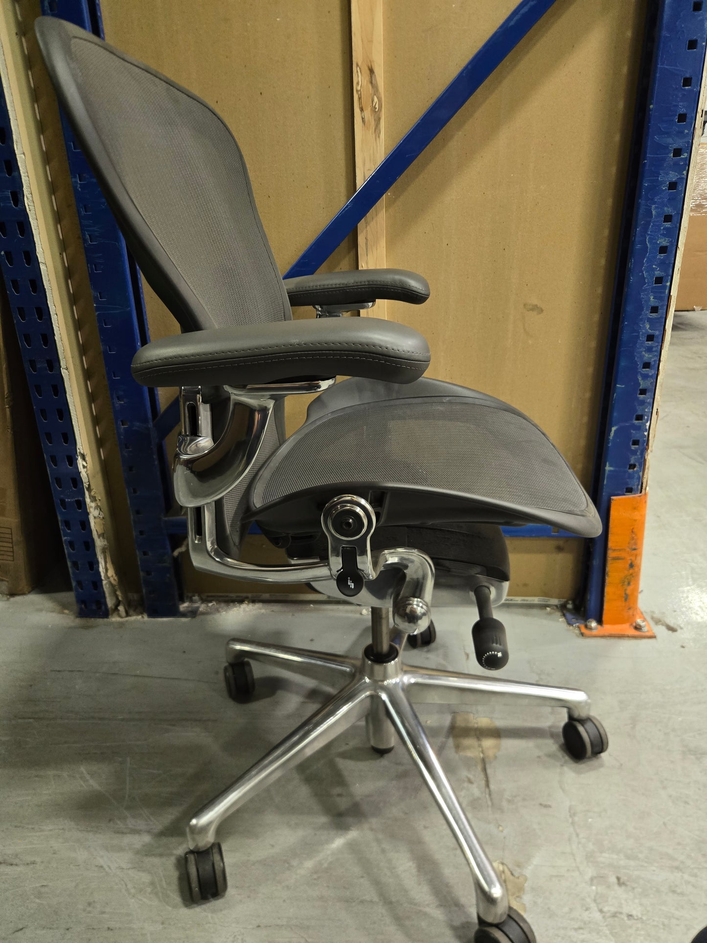 Herman Miller Executive Remastered Aeron Chair, Size B, in Graphite with Aluminum Base, Posturefit SL and Leather Armpads