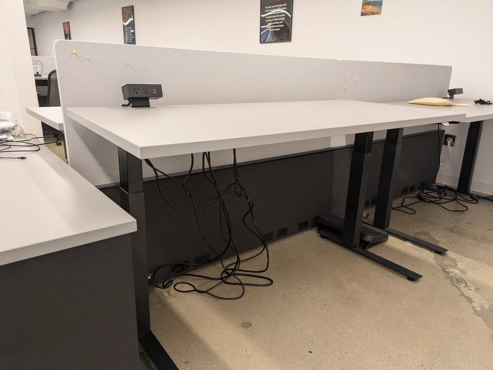 Herman Miller Nevi 64x29-in Sit-Stand Height Adjustable Desk in Grey